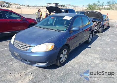 2004 Toyota Corolla Le z USA, uszkodzony, nr VIN JTDBR32E742047514